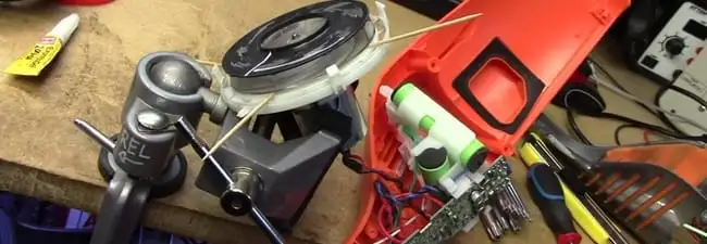 Vacuum cleaner repair parts and tools on a workbench in Yonkers, NY